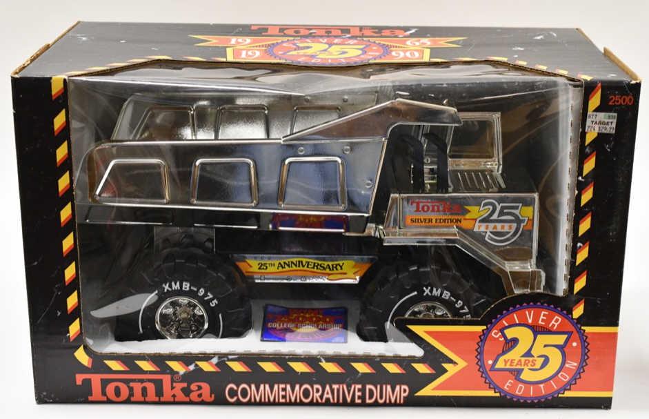1990 Tonka 25th Anniversary Silver Dump Truck: 1990 Tonka 25th Anniversary Silver Edition Dump Truck. The truck is in nice condition in the original box and is stock #503080. The Mighty Tonka Dump measures 16" long.