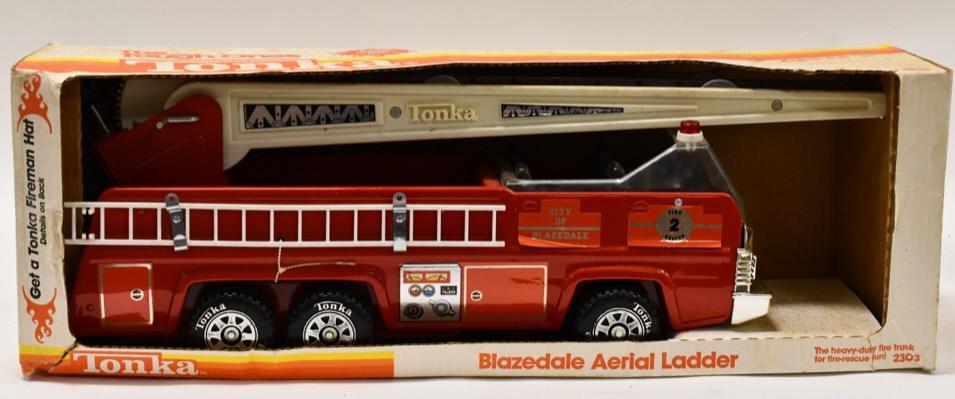 Tonka Blazedale Aerial Ladder Fire Truck: Tonka blazedale aerial ladder fire truck in the box. Dislays nicely with wear from storage and display. Measures approximately 26" long.