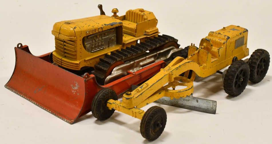 Hubley Diesel Bulldozer and Road Grader: Hubley diesel bulldozer and road grader. They display nicely with paint loss and wear from age. Grader measures approximately 10 1/2" long.