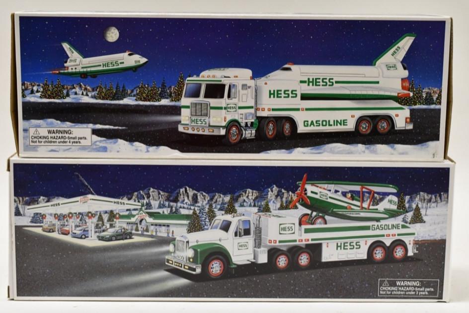 Hess Truck w/ Airplane Hess Truck w/ Space Shuttle: 1999 Hess toy truck and space shuttle with satellite. 2002 Hess toy truck and airplane. Nice condition in the original boxes. They display nicely with wear from storage and display. Largest measures a