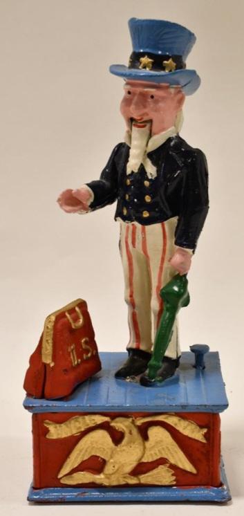 Mechanical Cast Iron Uncle Sam Bank: Contemporary mechanical cast iron Uncle Sam bank. Displays nicely. Measures approximately 11 1/2" tall.