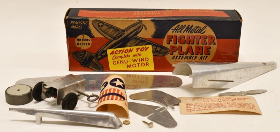 Streamline Toy Co. All Metal Fighter Plane Kit: Streamline Toy CO. all metal fighter plane assembly kit complete with Genu-Wind motor. Nice condition in the box. Box displays nicely with good graphics. Wingspan measures approximately 10" long.