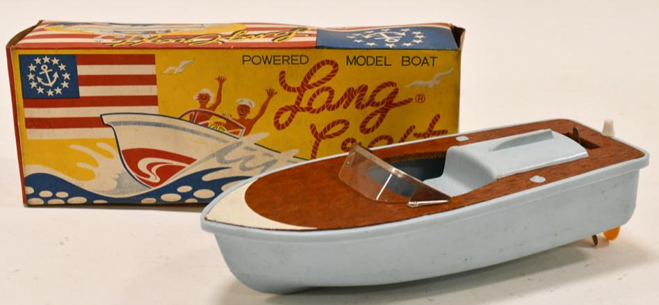 Japan Battery Powered Lang Craft Model Boat: Japan battery powered Lang Craft model boat with original box. Box has some staining and wear from age. The boat is in nice untested condition. Measures approximately 7 1/2" long.
