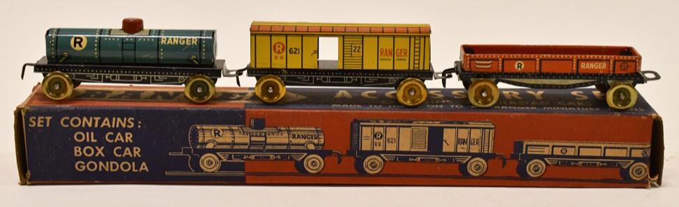 Tin Ranger Steel Products Train Accessory Set: Tin litho Ranger Steel Products train accessory set in the box. Contains 3 railroad cars made to hook on to all ranger miniature traines. Box measure approximately 10" long.