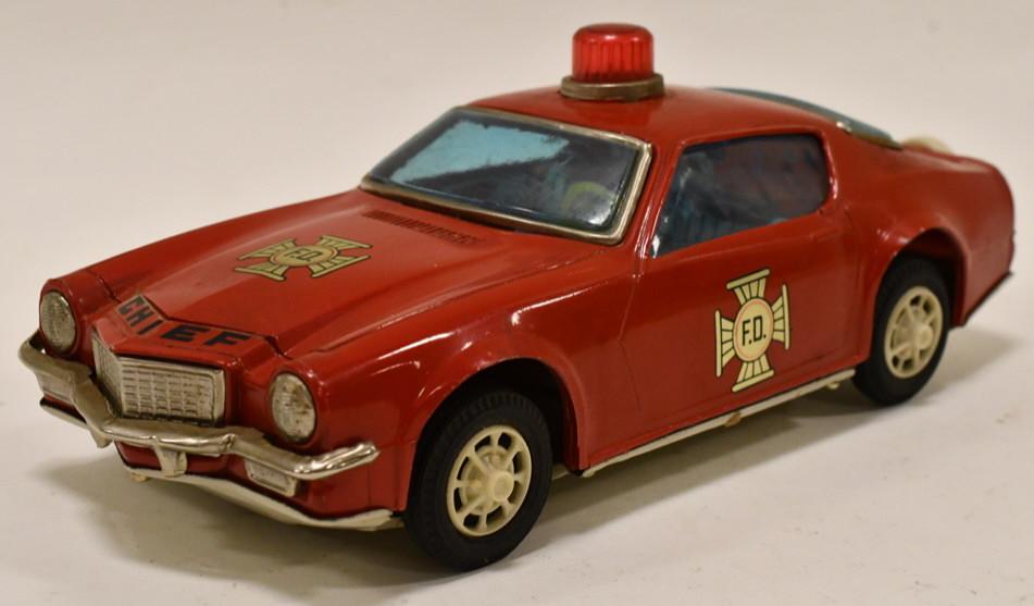 Tin Litho Pull String Windup Fire Dept. Chief Car: Chi Hung tin litho windup pull string windup fire dept. chief car. Displays nicely with light wear from play and age. The pull string works. Measures approximately 10 1/2" long