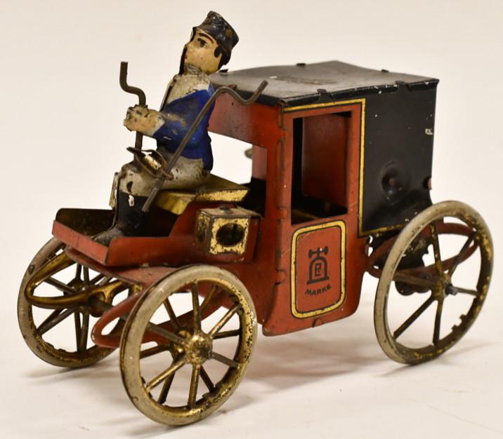 Early Marke Lehmann Germany Tin Windup Car: Tin windup Marke D.R.G.M Germany car. Displays nicely with paint loss and wear from play and age. One of the wheels has split in half, and is missing the other half. Windup does not work. Measures app