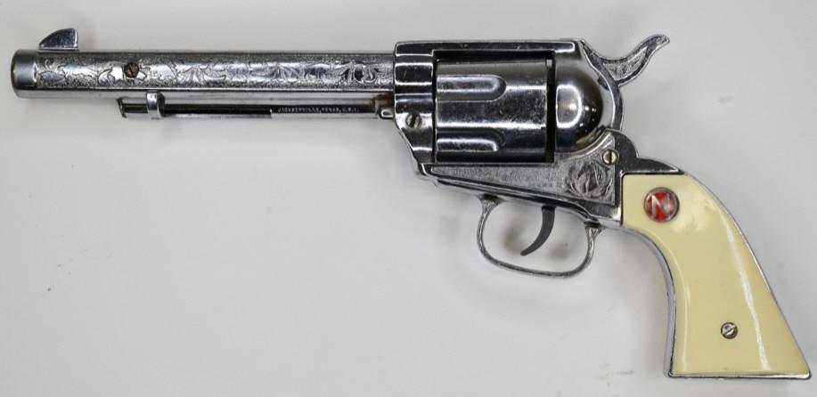 Nichols Stallion 45 Mark ll Cap Gun Pistol: Nichols Stallion 45 Mark ll cap gun pistol. Displays nicely with light wear from play and age. The trigger works. Gun measures approximately 11 1/2" long.