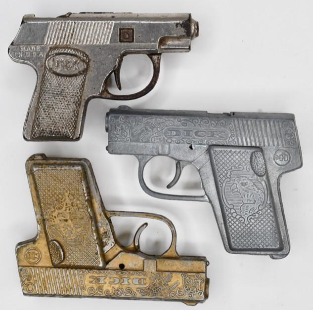 Lot of (3) Different Hubley Dick Cap Gun Pistols: Lot of 3 Hubley Dick cap gun pistols. Only 1 of the triggers work. All have wear from play and age. Longest measures approximately 4 1/4" long.