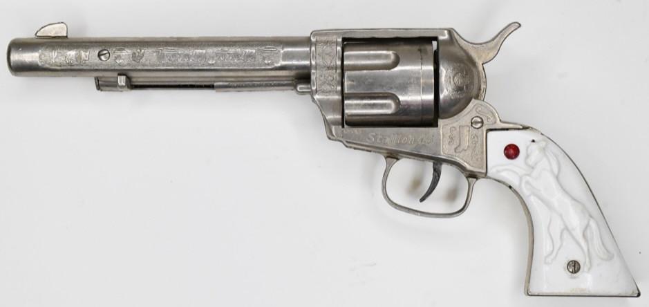 Nichols Stallion 45 Cap Gun Pistol: Nichols Stallion 45 cap gun pistol. Nice condition with some wear from play and age. Displays nicely. The trigger works. Measures approximately 11 1/2" long.