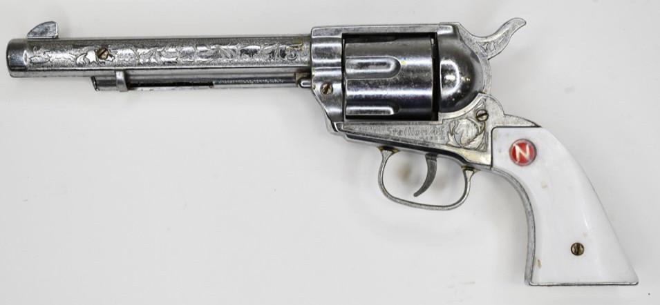 Nichols Stallion 45 Mark ll Cap Gun Pistol: Nichols Stallion 45 Mark ll cap gun pistol. Nice condition with some wear from play and age. Displays nicely. The trigger works. Measures approximately 11 1/2" long.