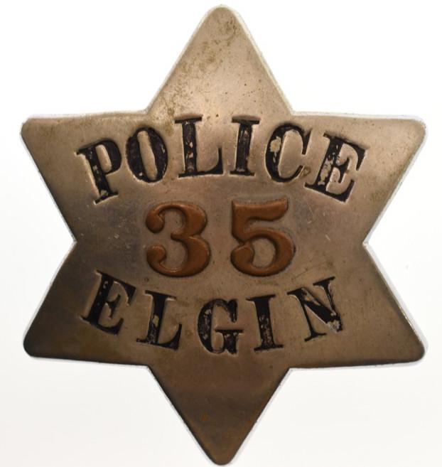 Obsolete Elgin ILL Police Pie Plate Badge No.35: Nice early obsolete Elgin Illinois Police "Pie Plate" badge no. 35 with copper numbers. Badge is in nice condition with wear from use and age. Has pinback. Back is marked "Meyer & Wenthe Chicago". It