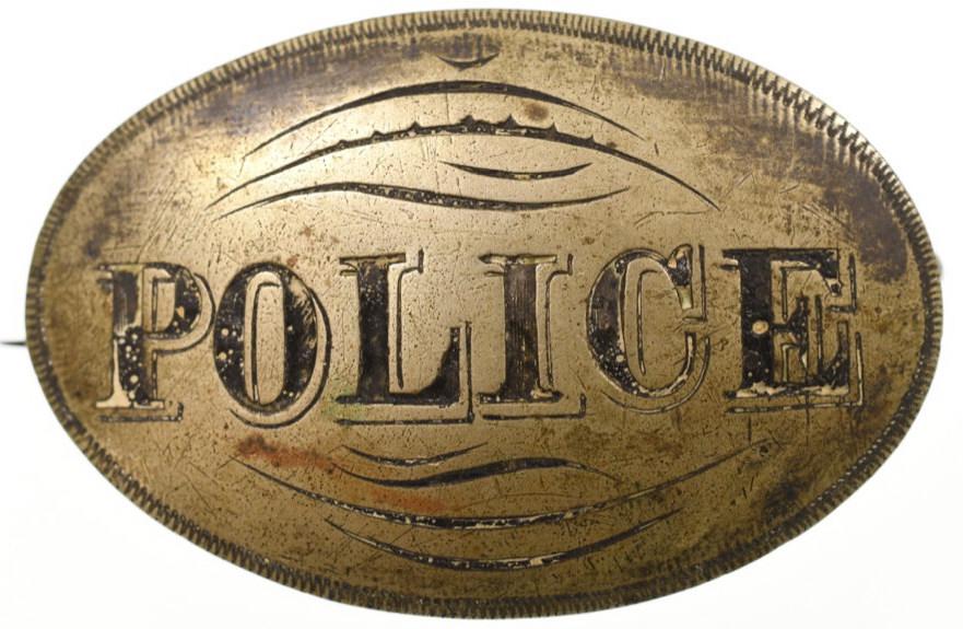 Early Obsolete Police Badge: Nice early obsolete Police badge. Badge is in good condition with wear from use and age. Has pinback. Back is unmarked. It measures approximately 2" across by 1-1/4" tall.