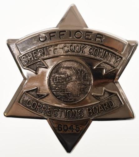 Sheriff Cook Co. Corrections Board Officer Badge: Nice obsolete six-point star Sheriff Cook County Illinois Corrections Board Officer Badge #6045. Badge is in nice condition with pinback. Back is unmarked. It measures approximately 3" tall by 2-3/4" 