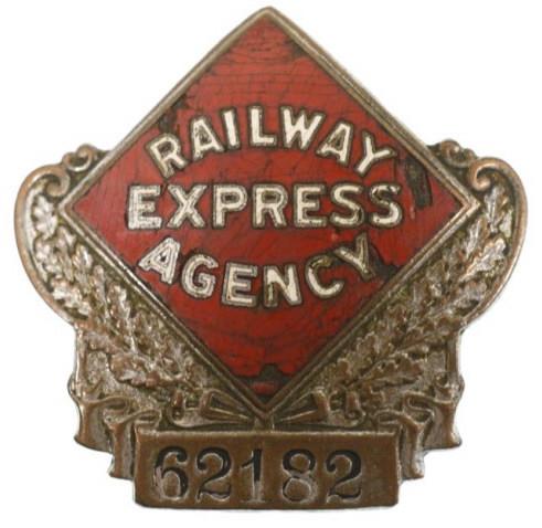 Obsolete Railway Express Agency Hat Badge #62182: Nice obsolete Railway Express Agency Hat Badge #62182. Badge is in nice condition with screw back, has some chips in he enamel. Back is unmarked. It measures approximately 2" tall by 2" across.