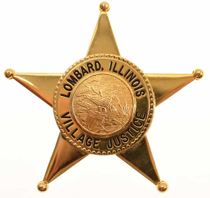 Obsolete Lombard ILL Village Justice: Nice obsolete five-point star Lombard Illinois Village Justice badge. Badge is in nice condition with missing pinback. Back is marked "Meyer & Wenthe". It measures approximately 3" tall by 3" across.