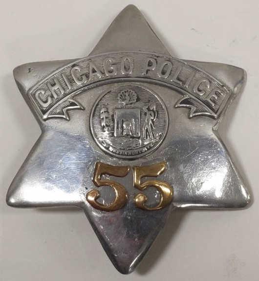 Obsolete Chicago Police Pie Plate Badge No. 55: Obsolete Chicago Illinois Police Pie Plate Badge no.55. Badge is in worn condition with new pinback added. Appears to have been heavily buffed and polished. Back is marked "C.H. Hanson". It measures a