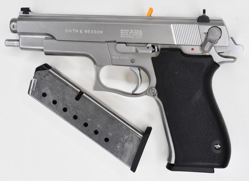 Smith & Wesson Model 4506 45 Auto Semi-Auto Pistol: New in box Smith & Wesson Model 4506 semi-automatic pistol in .45 Auto. The pistol is in new condition with a 5" barrel, stainless steel, factory 3-dot sights, two mags, and original box. SN: TCD5737.