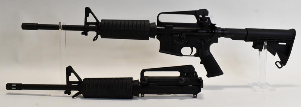 Olympic Arms M/4 AR/15 Semi-Automatic Carbine: Very nice Olympic Arms M/4 AR/15 semi-automatic carbine in .40 S&W and 10mm. The carbine is in great condition with two complete uppers, 16" chrome lined barrels, six position stock, (4) 10mm mags, (3