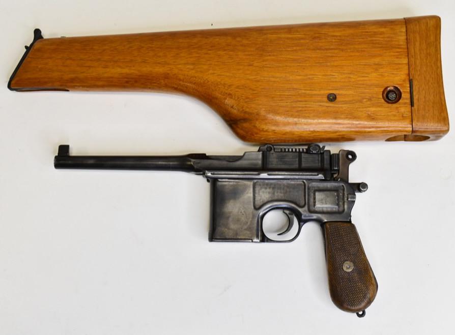 Mauser C96 7.62x25mm Semi-Auto Broomhandle Pistol: Nice Mauser C96 semi-automatic pistol in 7.63x25mm. The pistol has a 5.5" barrel and is in nice used condition, comes with reproduction butt stock. SN:22798. FFL required for transfer. (429-4)