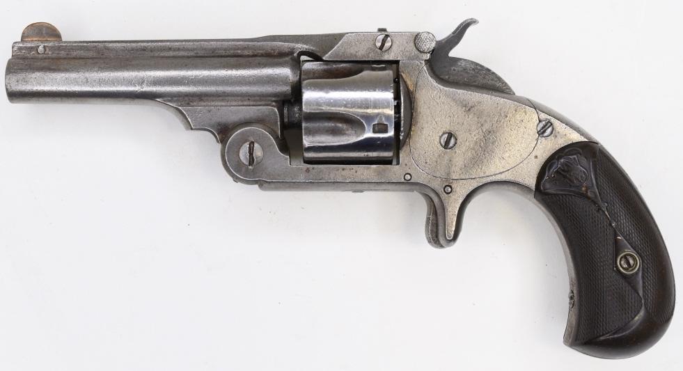Smith & Wesson 22 Cal Five-Shot Top Break Revolver: Smith & Wesson 5-shot top break revolver in .22 caliber. The revolver comes with a 3" barrel and is in good used condition with wear. SN:58239. FFL required for transfer. (824-2)