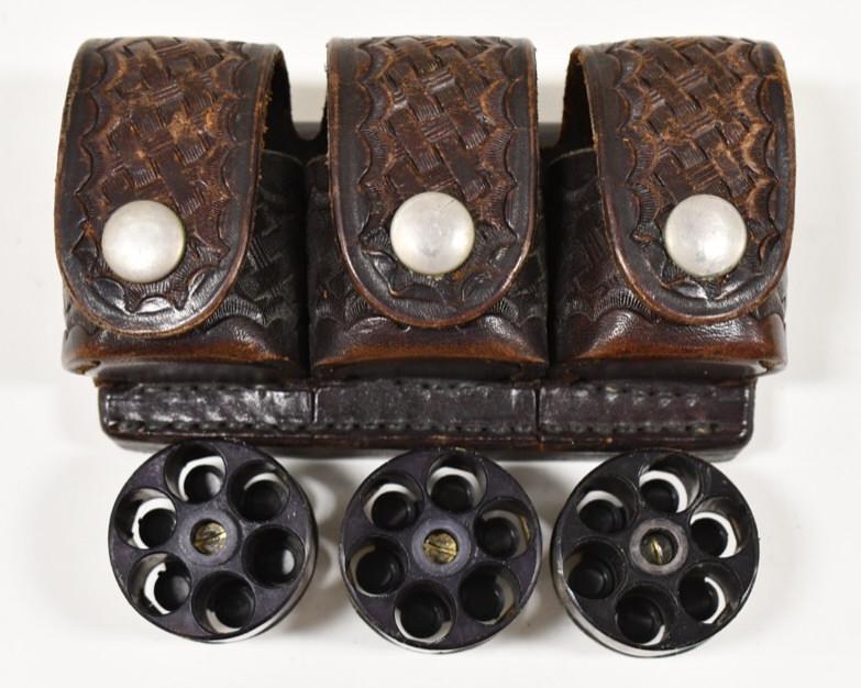 (3) Vintage Dade Colt Frame Revolver Speed Loaders: Nice set of three Dade Colt frame speedloaders in a Tex Shoemaker & Sons leather belt case. Great vintage condition.