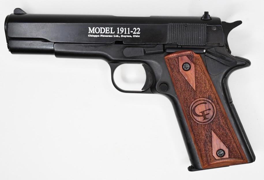 Chiappa 1911-22LR Semi-Automatic Pistol In Box: In box Chiappa Firearms Ltd 1911-22 semi-automatic pistol in .22L. The pistol is in nice used condition with a 5" barrel, cleaning tool, instructions, and original hard case. SN: D41685. FFL required 