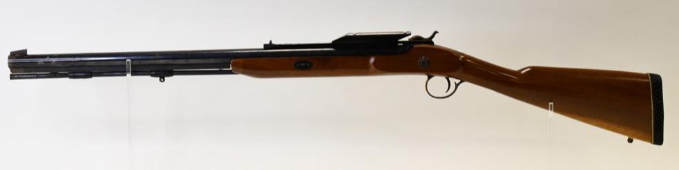 Thompson Center Arms .50 Cal Muzzleloader: Thompson Center Arms .50 Cal Muzzleloader with scope mount. Finish wear to the barrel and trigger guard. SN: 20432