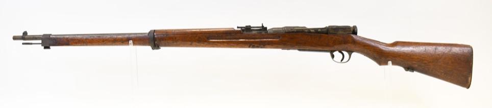 Rare Nippon Special Arisaka Type 99 Training Rifle: Rare Nippon Special Steel makers mark Type 99 Arisaka rifle. Only mark on the gun is the Nippon Special Steel mark. With the lack of markings on the gun, we are led to believe this is a trainer model.