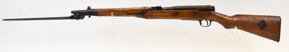 Tokyo Arsenal Type 38 Carbine w/ Folding Bayonet: Tokyo Arsenal type 38 carbine rifle with folding bayonet. Mum is completelty removed. Dust cover with surface rust. SN: 020382. FFL is required for transfer. (366-4)