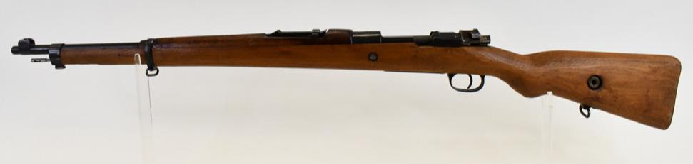 1945 Turkish Mauser Bolt Action 8mm Rifle: Nice dated 1945 Turkish Mauser bolt action rifle in 8mm. The rifle has a 24.5" barrel and is in good used condition, non-matching serial numbers. SN:9815. FFL required for transfer. (200-4)