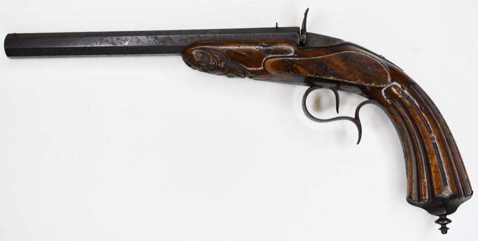 Antique Flobert .22 Cal. Percussion Pistol: Antique Flobert Percussion Pistol in .22 caliber. The pistol has a 9" barrel and is in good antique condition. Has nice carved stock. No serial number.