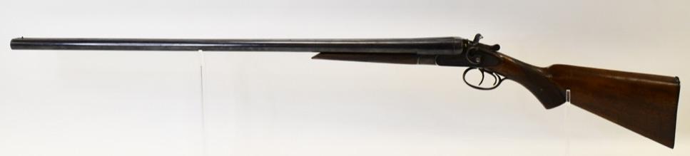 Antique Manhattan Arms 12 Ga. Side x Side Shotgun: Antique made in Belgium Mahattan Arms Company side x side shotgun in 12 gauage. The shotgun is in good condition with a 32" barrel.