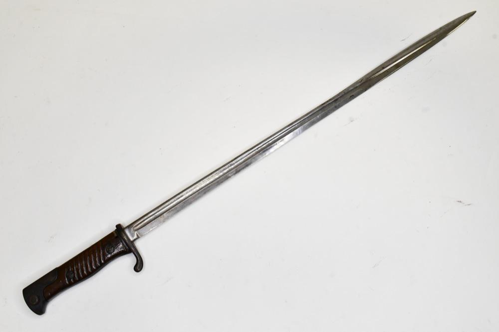 WWI German M1898 Bayonet by W.K. & C.: Hard to find original WWI German model 1898 Mauser bayonet by W.K. & C. Bayonet is in fair condition with wear from use and age. Missing scabbard. Overall it measures approximately 25-1/2" across. Bla