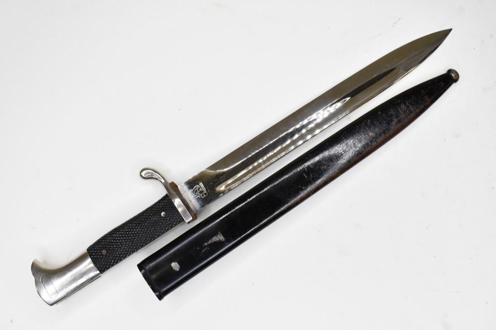 WWII German Eickhorn Dress Bayonet w/ Scabbard: WWII German dress bayonet with scabbard by Eickhorn Solingen. Nice condition ith light wear from use and age. Scabbard does have paint loss and wear. Overall with scabbard it measures approximately 16