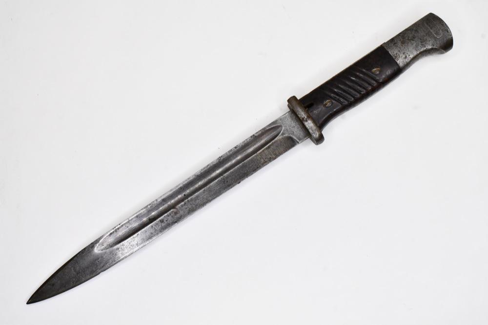 WWII German K98 Mauser Bayonet: WWII German K98 Mauser bayonet. Good condiiton with wear from use and age. Blade is marked. Overall it measures approximately 15" across. Blade measures approximately 9-3/4" across.