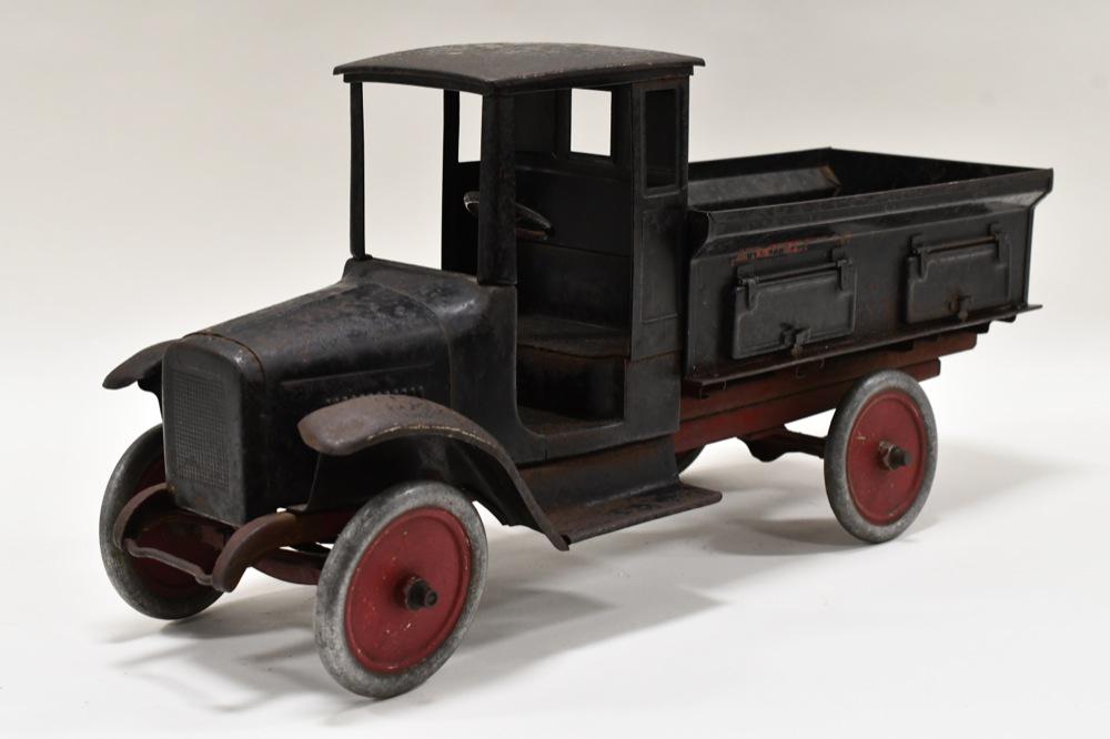 Original Buddy L Sand & Gravel Truck: Original Buddy L Sand & Gravel truck. Truck is in nice original condition. It is missing the divider in the bed. Displays well with some rust and paint loss from play and age. Measures approximately 2