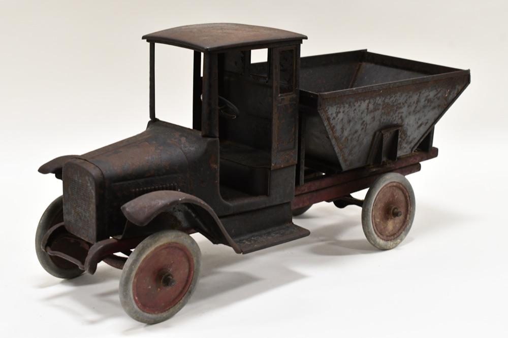 Original Buddy L Coal Truck: Original Buddy L coal truck. Truck is in nice original condition. Displays well with some rust and paint loss from play and age. It is missing the chute. Measures approximately 25" long.