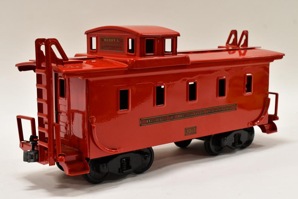 Buddy L Outdoor Railroad Caboose #3017: Restored Buddy L Outdoor Railroad Caboose #3017. It has some paint streaks. Displays nicely with wear from storage and display. Overall measures approximately 30" long.