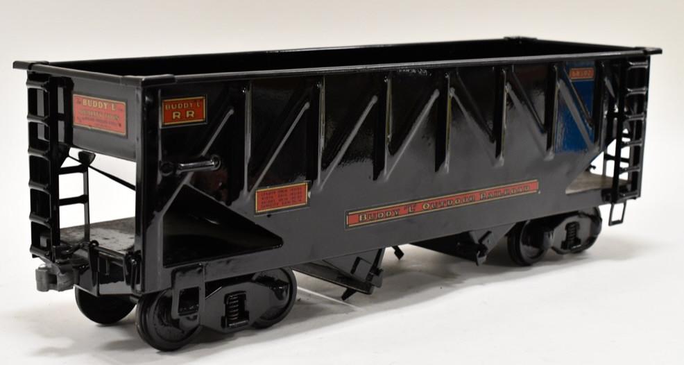 Buddy L Outdoor Railroad Bottom Dump Hopper Car: T-Reproduction Buddy L Outdoor Railroad bottom dump hopper car. Decal reads #68502. Displays nicely with wear from storage and display. Overall measures approximately 21 1/2" long.