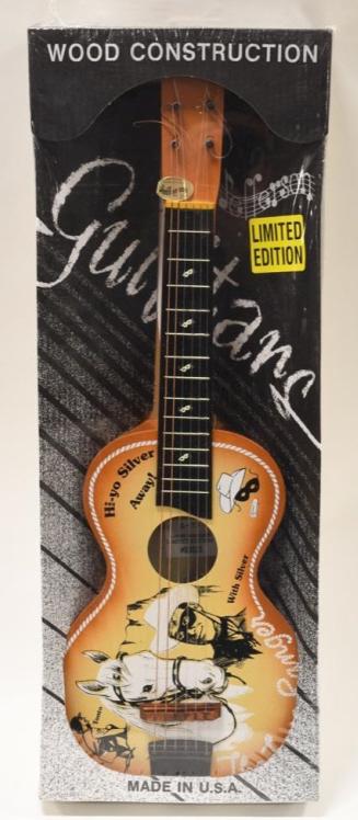 Jefferson MFG. The Lone Ranger Acoustical Guitar: Nice Jefferson MFG. Co. The Lone Ranger wood constructed acoustical guitar in the box. The box has the plastic wrap on it. Displays nicely. Box measures approximately 29" long.
