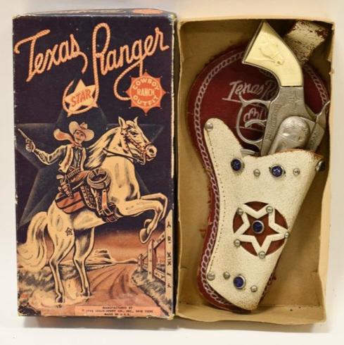 Leslie-Henry Texas Ranger Cap Gun Pistol: Leslie-Henry Texas Ranger cap gun pistol with holster in the original box. The box displays very well with nice graphics. The gun and holster has light wear from storage and age. Overall the set displ