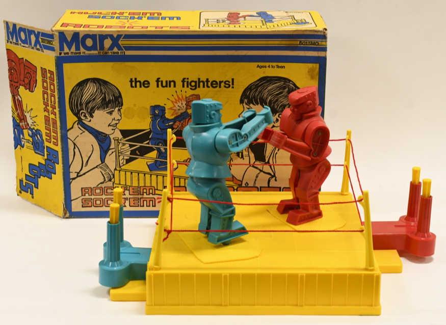 Marx Rock' Em Sock' Em Robots: Nice Marx Rock'Em Sock'Em Robots with the original box. Box has good graphics and color. Displays nicely with light wear for age. Toy is in nice condition with some wear from play and age.