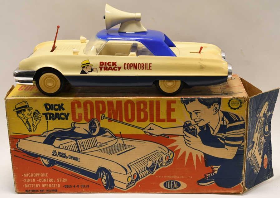 1963 Ideal Dick Tracy Copmobile In Box: Nice condition in the original box 1963 Ideal Dick Tracy battery operated Copmobile Stock No. 4809-D. It is missing the rod, and push rod. Copmobile has some scuffs and wear from play and age. Comes w