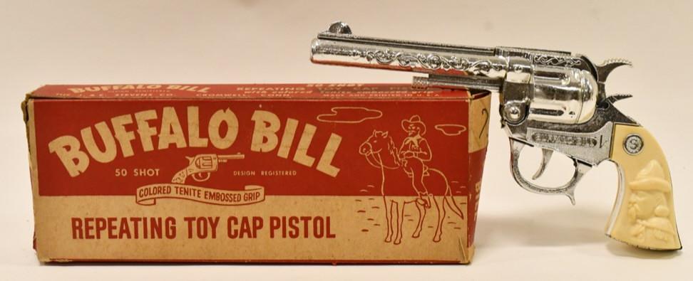 J&E Stevens Buffalo Bill Cap Gun Pistol: J&E Stevens Buffalo Bill repeating toy cap pistol with the box. The cap gun is in nice condition. Appears to almost be unfired. The trigger works. Box has wear and tear from age. Cap gun measures appr