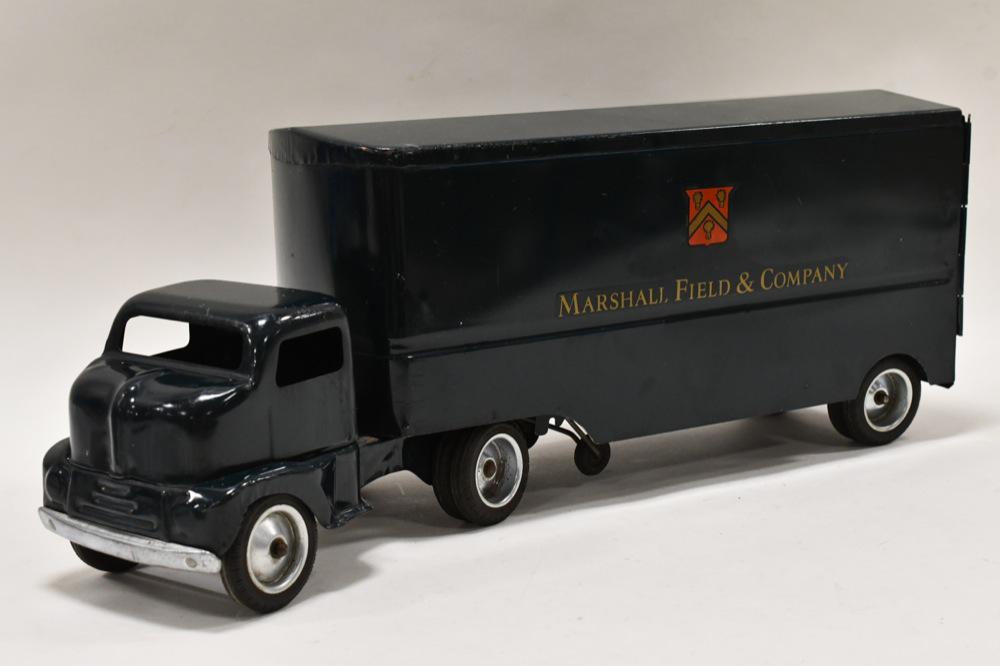 Tonka Marshall Field & Company Truck and Trailer: Tonka private label Marshall Field & Company cab over truck and trailer. The trailer appears to have some touch ups on the bottom. Displays nicely with some paint loss and wear from play and age. Meas
