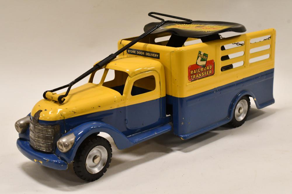 Buddy L Railroad Transfer Pull-N-Ride Truck: Nice Buddy L railroad transfer pull-n-ride delivery truck. Overall nice condition with light paint loss and wear from play and age. Displays nicely with great color! Measures approximately 22 1/2" lon
