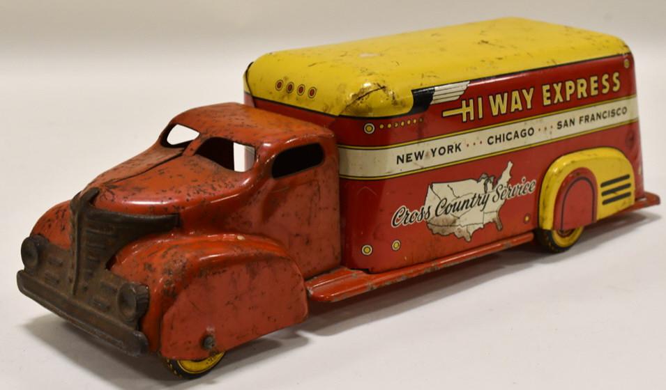 Marx Hi Way Express Cross Country Service Truck: Marx Hi Way Express Cross Country Service delivery truck. It is missing the rear door. Displays nicely with paint loss and wear from play and age. Measures approximately 16" long.
