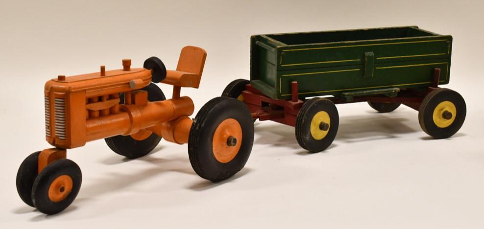 Peter Mar Wood Allis Chalmers Tractor with Wagon: Peter Mar wood toys Allis Chalmers tractor with wagon. The waon has a crack in the wood right above the hitch. Good condition with wear from play and age. Overall measures approximately 31" long.