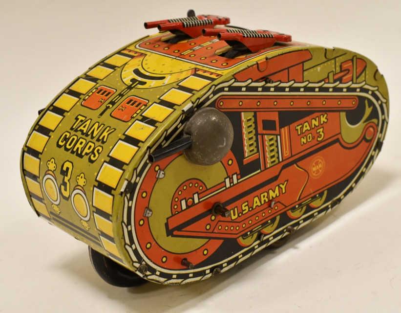 Marx Tin Litho Windup Tank No. 3: Marx tin litho windup tank no. 3. The tank is in overall nice condition with light wear from age. The windup mechanism works. Displays very nicely with great color. Measures approximately 8" long.