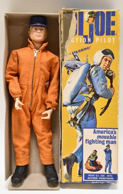 1964 Hasbro GI Joe Action Pilot #7800: 1964 Hasbro GI Joe Action Pilot #7800 with the box. The box has wear and tear from age. The figure has staining and wear from play and age. Displays nicely. Measures approximately 12" tall.